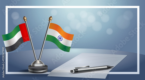 United Arab Emirate and India National flags on small table with bokeh background, cooperative relationship