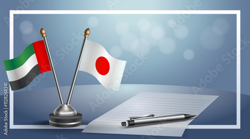United Arab Emirate and Japan National flags on small table with bokeh background, cooperative relationship