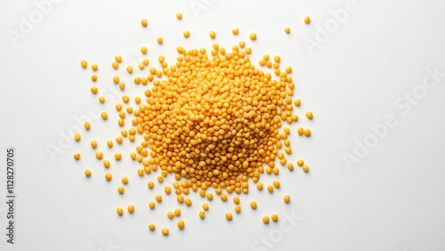 Overhead Shot of Golden Yellow Lentils Scattered on White Background, Vibrant Food Photography for Culinary, Health, and Agriculture Concepts photo