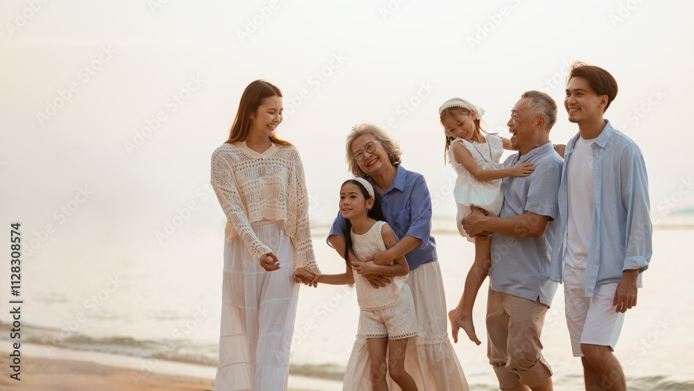 family, parents, kids, parent, children, community, senior, dad, elderly, father. A family of five is walking on the beach. Scene is happy and relaxed, as the family enjoys spending time. family, parents, kids, parent, children, community, senior, dad, elderly, father. A family of five is walking on the beach. Scene is happy and relaxed, as the family enjoys spending time.