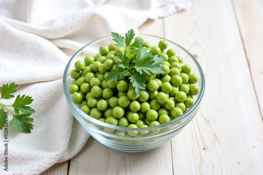 Glass bowl green peas parsley sprig wooden surface natural light Glass bowl green peas parsley sprig wooden surface natural light