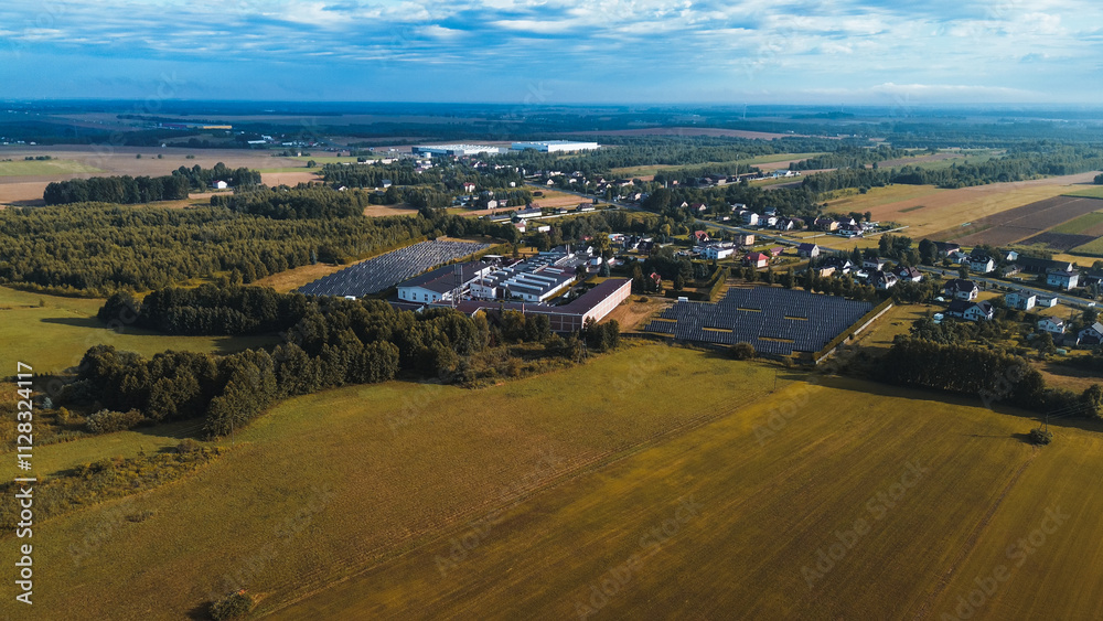 Fototapeta premium Solar panels on factory in sunlight