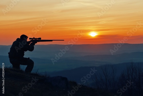 silhouette of a shooter aiming at sunset