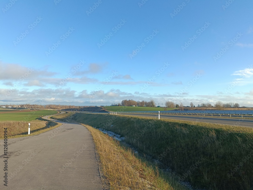 Completed road in Motiekaicio street. New road in Siaulai. Finished road in suburbs. Fields at side. Baigta gatve Motiekaicio gatveje Siauliuose. Completed road in Motiekaicio street. New road in Siaulai. Finished road in suburbs. Fields at side. Baigta gatve Motiekaicio gatveje Siauliuose.