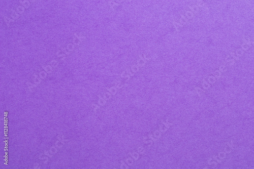 A purple background with a white and purple textured surface, textured origami paper backdrop