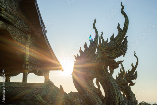 The beautiful Wat Sirindhorn Wararam Phuproud in Ubon Ratchathani province during sunset. Travel, tourism, holiday concept. photo