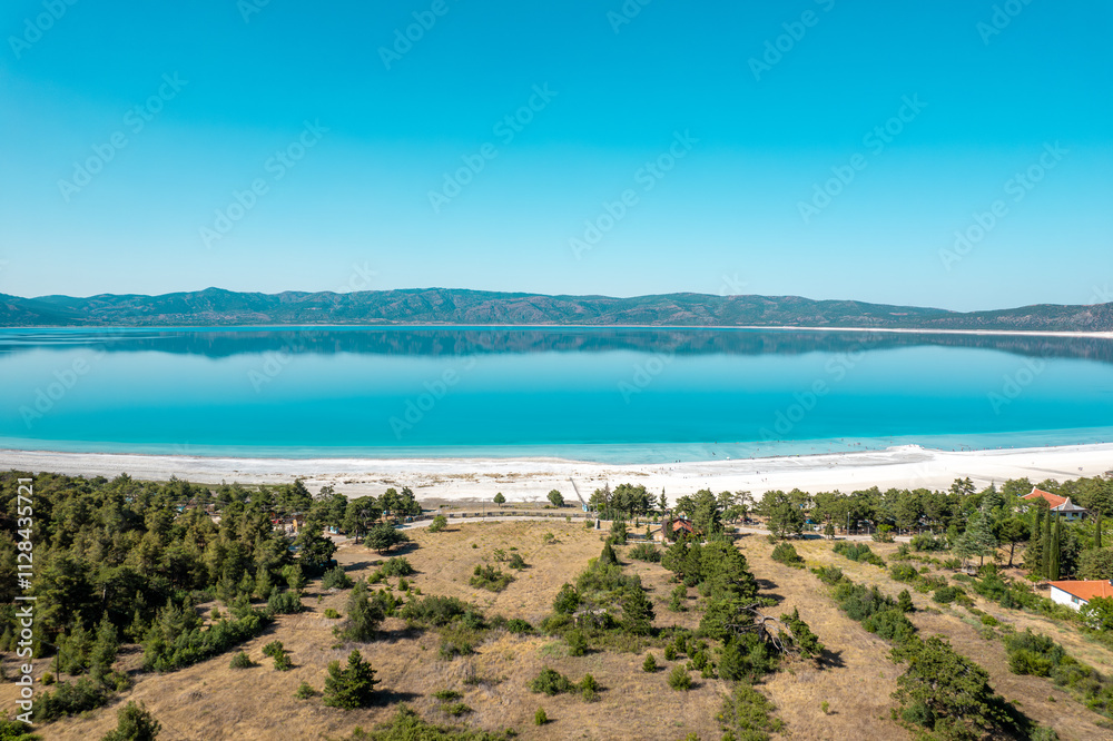 On the shores of Salda Lake. Salda Lake is a popular travel destination for people coming from the region and outside the region due to the hydromagnesite mineral it contains. Burdur - Türkiye