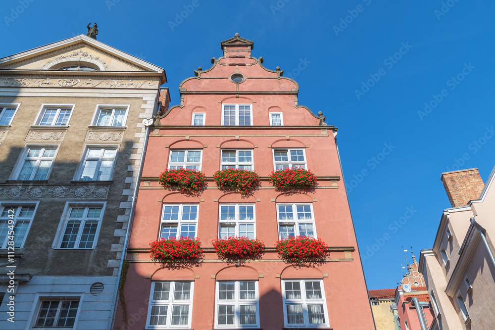 Fototapeta premium Beautiful historical buildings in the city center. Old Town, Gdansk, Poland. Architecture details.