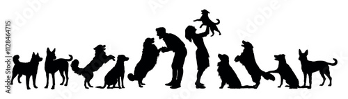 Couple playing with group of dogs side view isolated black silhouettes.