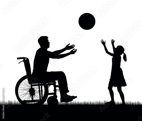 Father on wheelchair and little daughter playing catch throwing the ball between each other on grass field outdoor silhouettes.