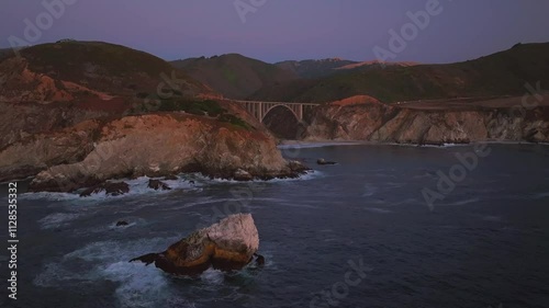 Bixby Bridge Big Creek Pfeiffer Canyon Santa Lucia Mountains Big Sur California aerial drone stunning dusk sunset Pacific Ocean Coastal Highway windy road rugged coastline waves crashing static motion photo