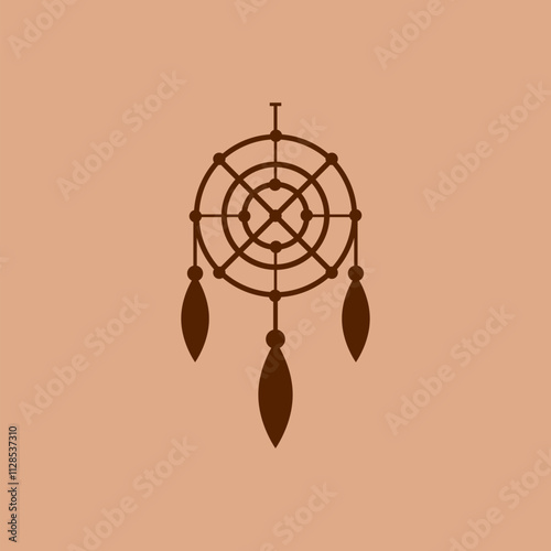 Dream catcher on brown background.