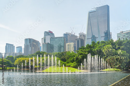 Photography Scenic fountains in a green urban park of Kuala Lumpur