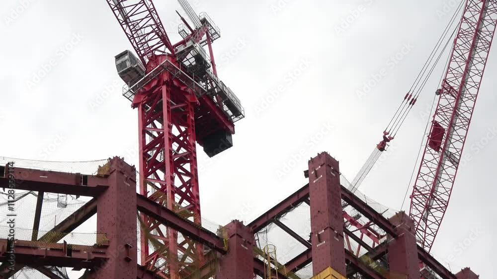 The construction site is a hive of activity as cranes swing into action. The construction site is a hive of activity as cranes swing into action.