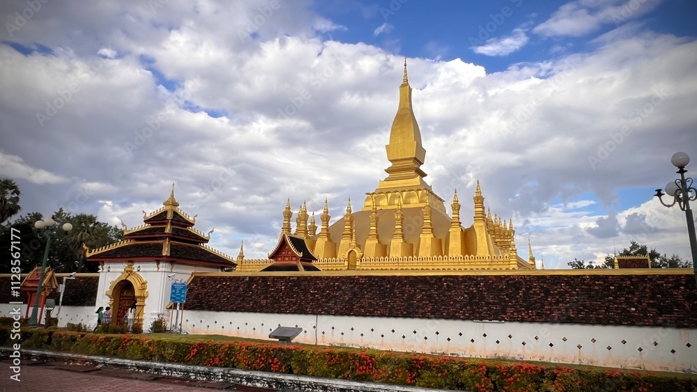 Naklejka premium Pha That Luang or Loka Chulamani Stupa is the largest and most beautiful stupa in the Kingdom of Laos.