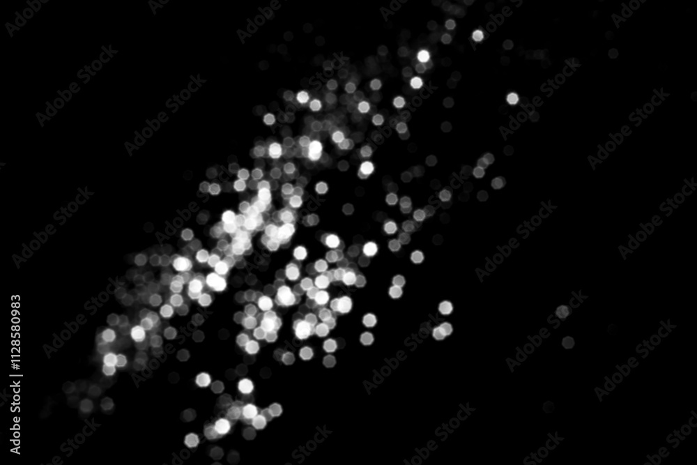 White gray blurred bokeh lights on black background White gray blurred bokeh lights on black background