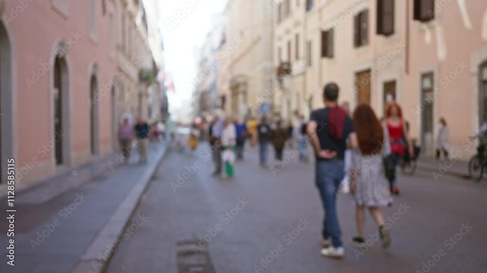Blurry image of people walking on a historic street in rome, italy, capturing a lively city atmosphere with buildings and pedestrians out of focus. Blurry image of people walking on a historic street in rome, italy, capturing a lively city atmosphere with buildings and pedestrians out of focus.