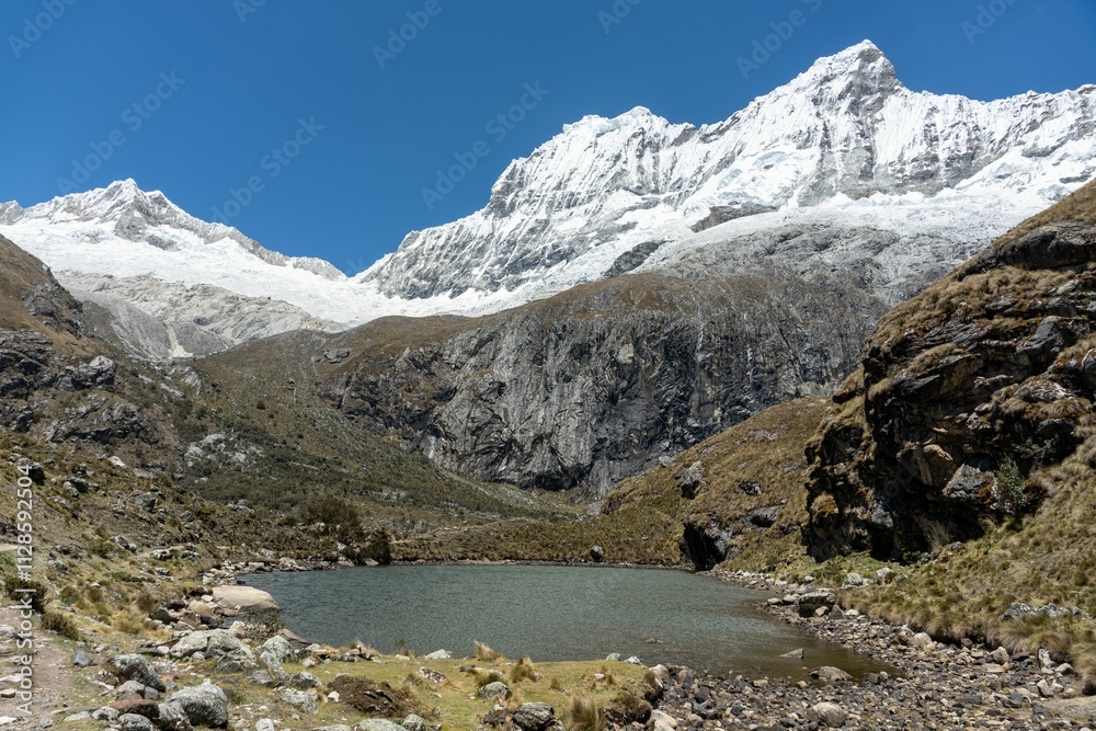 Snow-capped Andes with tranquil lake