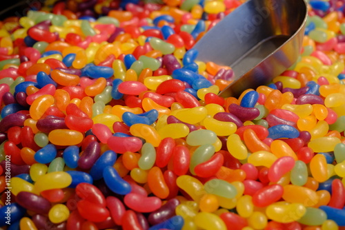 Close-up of colorful jelly beans for children sold in a dessert shop. Food industry. Dessert varieties. Junk food, fun candies.