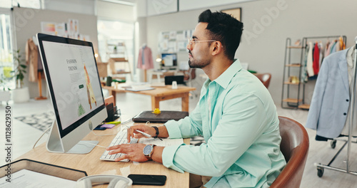 Wallpaper Mural Fashion designer, man or computer at desk for planning clothing design or inspiration for product aesthetic. Small business, entrepreneur or reading market research for online ideas or creative style Torontodigital.ca