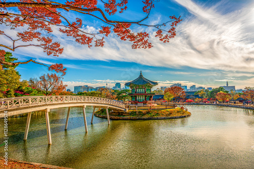 Photography Hyangwonjeong Pavilion, a pavilion in the middle of the water in autumn at Gyeongbokgung Palace, a tourist attraction that attracts many tourists in Seoul, South Korea