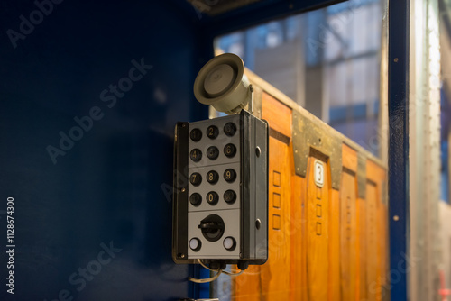 Control panel with numeric keypad in a modern industrial setting