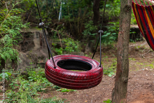 A swing made of old tires