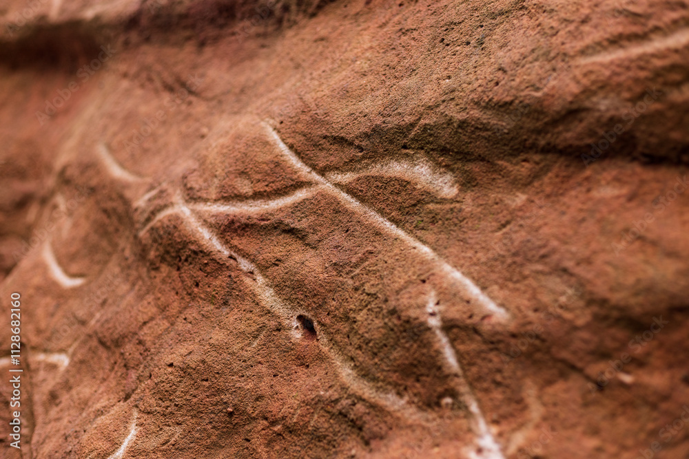 Fototapeta premium Natural red stone gouge marks left by a stone chipper