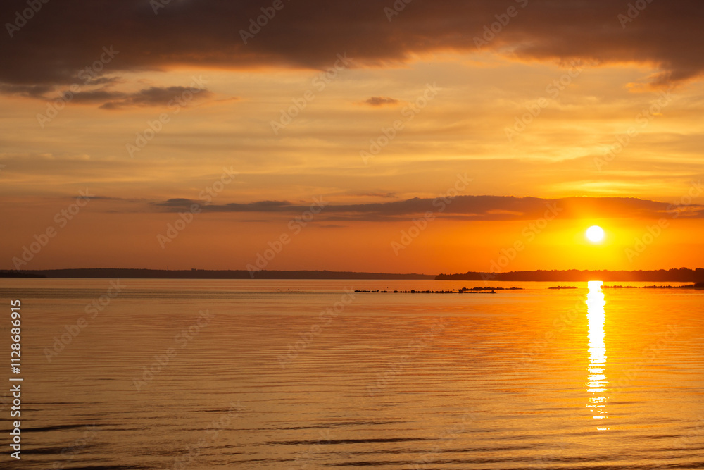 colorful background of the sunset on the sea, the horizon is a calm sky colorful background of the sunset on the sea, the horizon is a calm sky