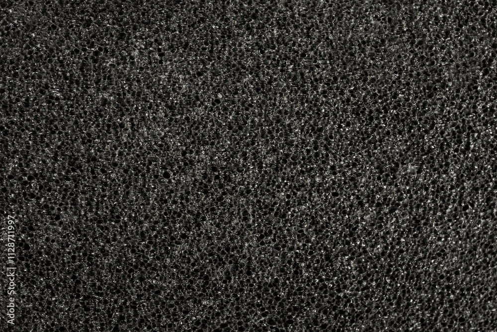 Black color pumice stone, close up structure , abstract backdrop Black color pumice stone, close up structure , abstract backdrop
