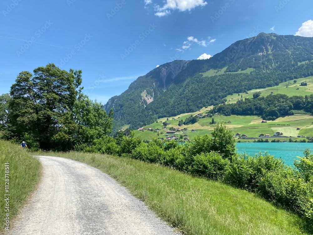 Promenade along Lake Lungern or recreational trails along the natural reservoir Lungernsee - Canton of Obwald, Switzerland (Spazierwege entlang des Lungererses - Kanton Obwalden, Schweiz) Promenade along Lake Lungern or recreational trails along the natural reservoir Lungernsee - Canton of Obwald, Switzerland (Spazierwege entlang des Lungererses - Kanton Obwalden, Schweiz)