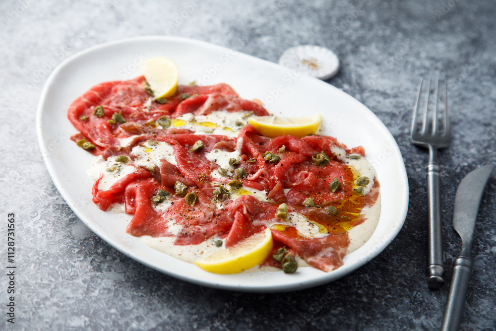 Beef carpaccio with tuna sauce Beef carpaccio with tuna sauce
