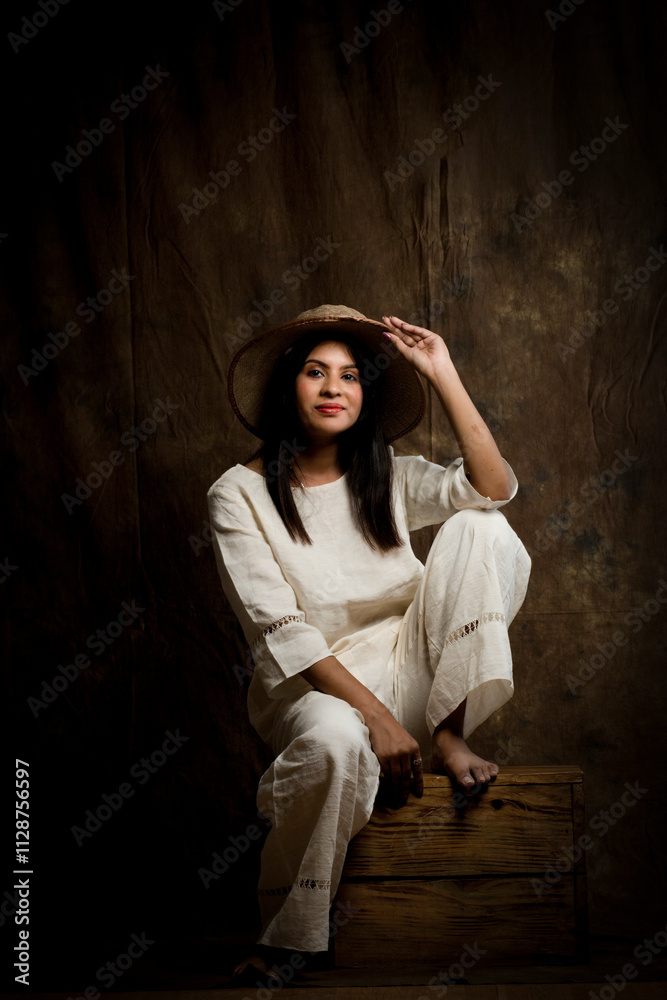 Solo Image of a Beautiful Female Model in White Linen Shirt and Trousers Solo Image of a Beautiful Female Model in White Linen Shirt and Trousers