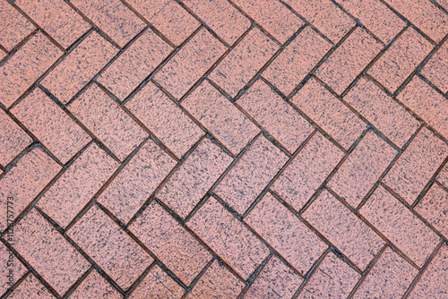 Herringbone paving block pattern closeup