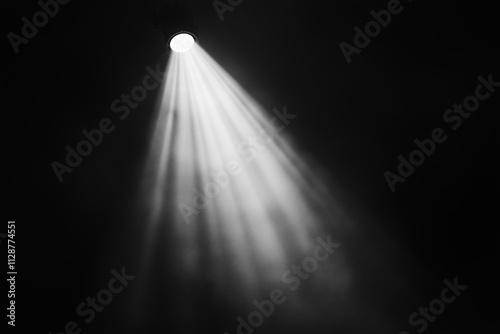 Bright spotlight cuts through misty smoke. God’s light radiates beams down creating fantasy glow. Black background enhances mystical magical atmosphere.