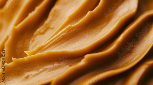 Close-Up of Velvety Caramel Spread with Smooth Ridges