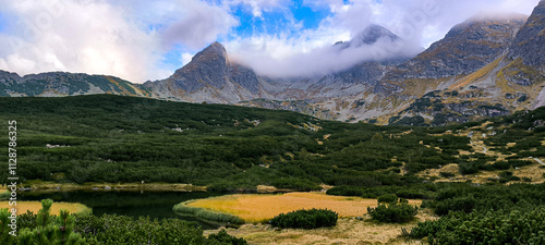 Hiking in the mountains as a favorite hobby. Active lifestyle. Views of the Tatra Mountains and Western Tatras from hiking trails. Mountain peaks, slopes, lakes and valleys between mountains