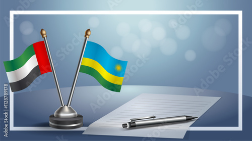 United Arab Emirate and Rwanda National flags on small table with bokeh background, cooperative relationship