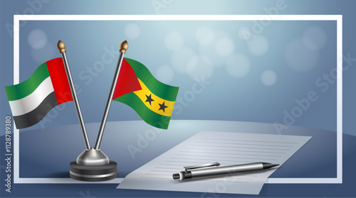 United Arab Emirate and Sao Tome and Principe National flags on small table with bokeh background, cooperative relationship