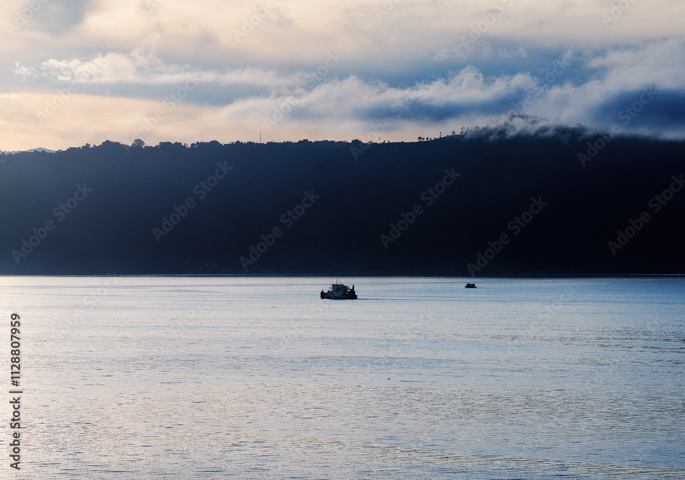 Beautiful sunset on the tropical island of Danau Toba