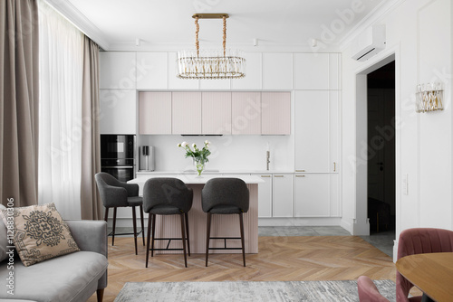 A Contemporary Modern Kitchen Design Featuring an Island and Elegant Ambient Lighting Choices