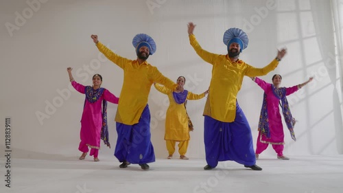 Sikh People performing bhangra during Baisakhi celebration