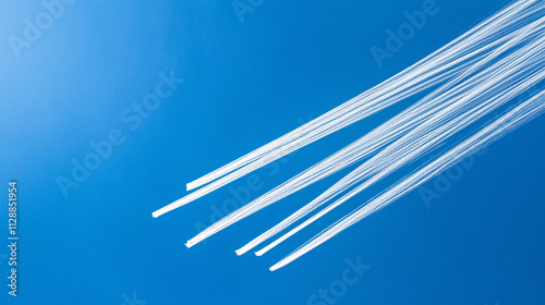 Wallpaper Mural Four bright white lines drawn confidently across a clear blue background, ideal for technology and design.

 Torontodigital.ca