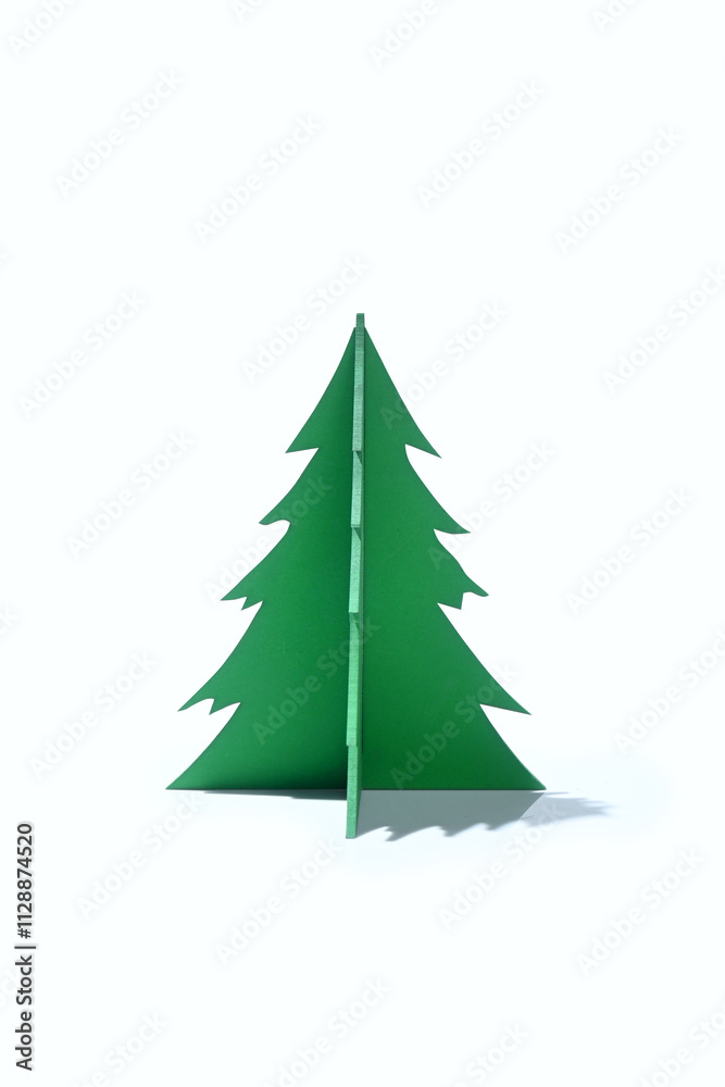 Closeup view of a Christmas tree miniature on a white background Closeup view of a Christmas tree miniature on a white background