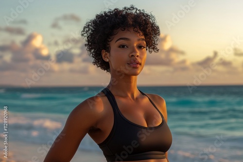 A hyperrealistic photo of a black woman with short curly hair jogging at sunrise on Cancun’s pristine beach, wearing premium athletic gear, vibrant lighting 1