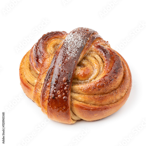 Single homemade fresh baked swedish cardamom bun isolated on white background close up photo