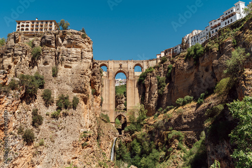 Puente Nuevo bridge what means New Bridge - unique architecture construction over the El Tajo Canyon with Guadalevin river waterfall in Ronda town, province of Malaga, Andalusia, Spain.