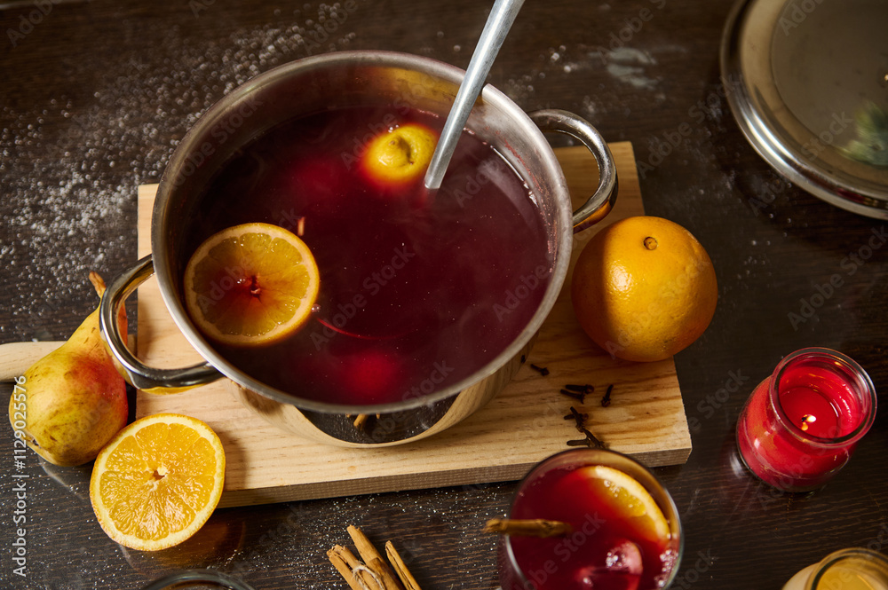 Warm mulled wine with oranges and spices for festive gatherings Warm mulled wine with oranges and spices for festive gatherings