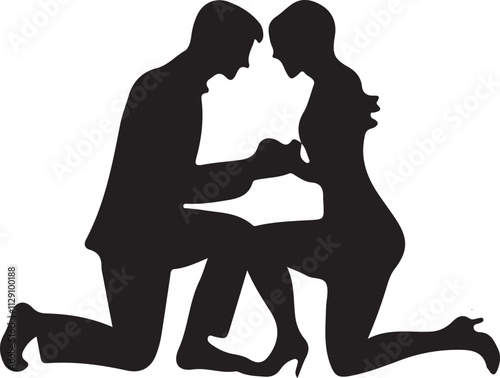 A man and a woman are sitting on the ground with a heart shaped box