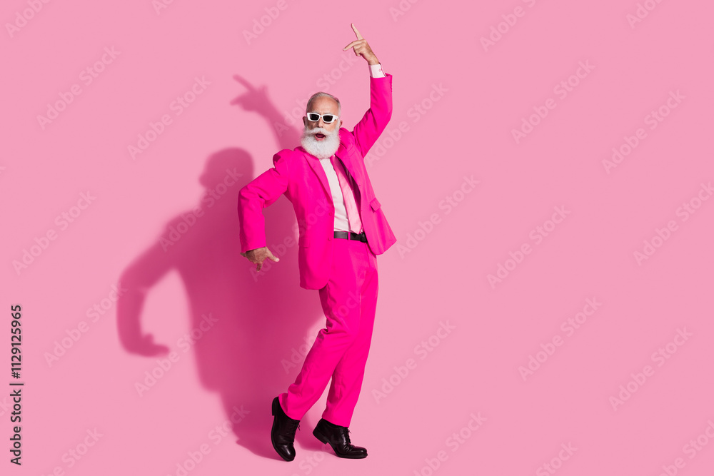 Full size photo of cool pensioner santa claus male anchorman dance have fun dressed sunglass trendy pink suit isolated pastel background Full size photo of cool pensioner santa claus male anchorman dance have fun dressed sunglass trendy pink suit isolated pastel background